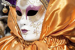 Venetian masks and brocades